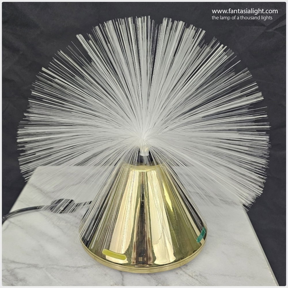 Fantasia Saturn - Model 2050 Cone shaped base with colorful illuminated segments on the base. Model produced by Vicon.